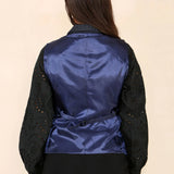 Blåt jakkesæt til dame i tweed-tern