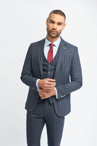Man wearing a gray pinstripe suit with a red tie on a white background