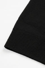 Sort herre strikket poloshirt med lynlåsudskæring og korte ærmer i blød blanding