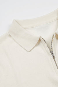 Herre Off-white strikket poloshirt med lynlåsudskæring og korte ærmer i blød blanding